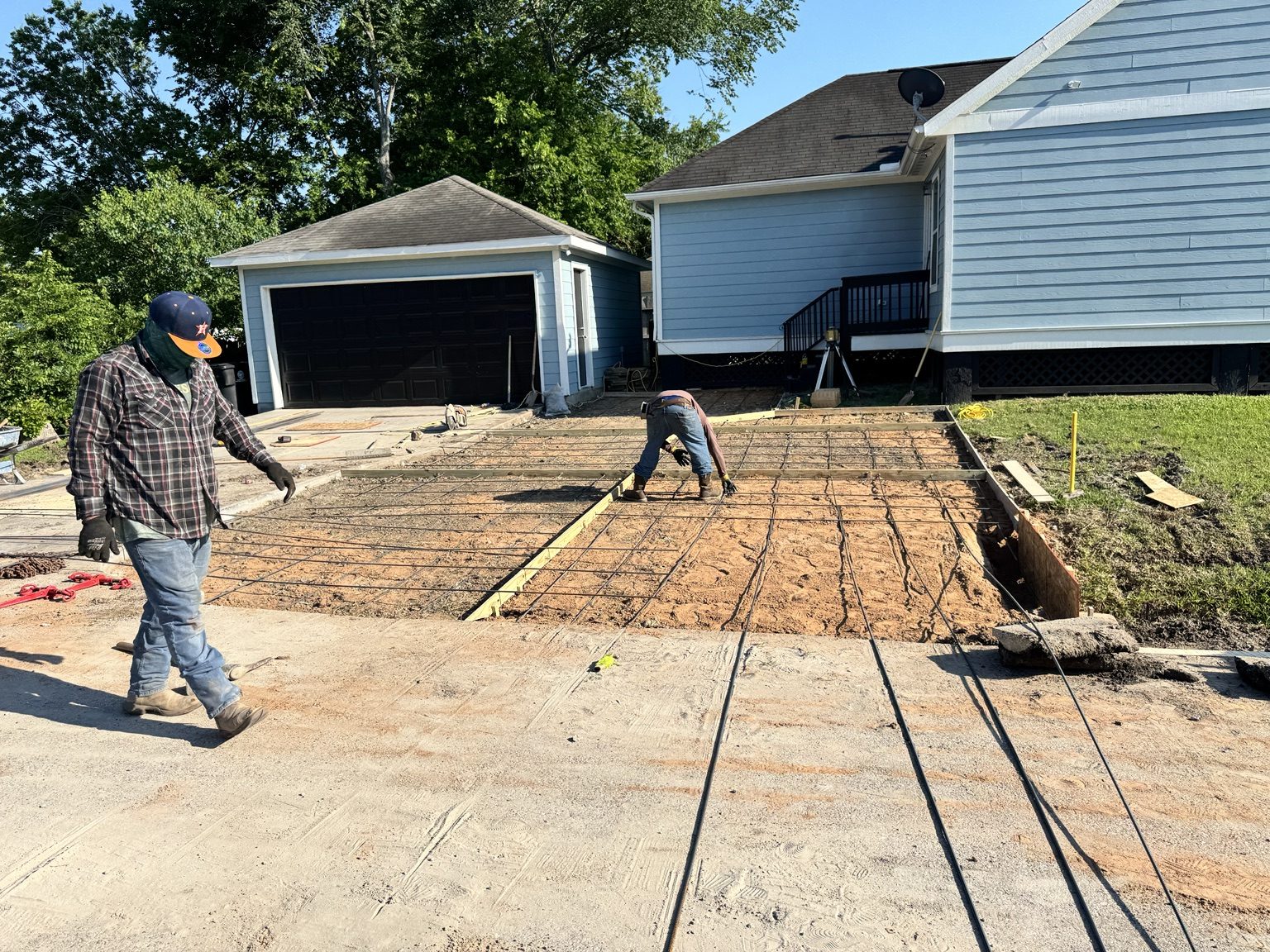 Concrete driveway preparation with rebar