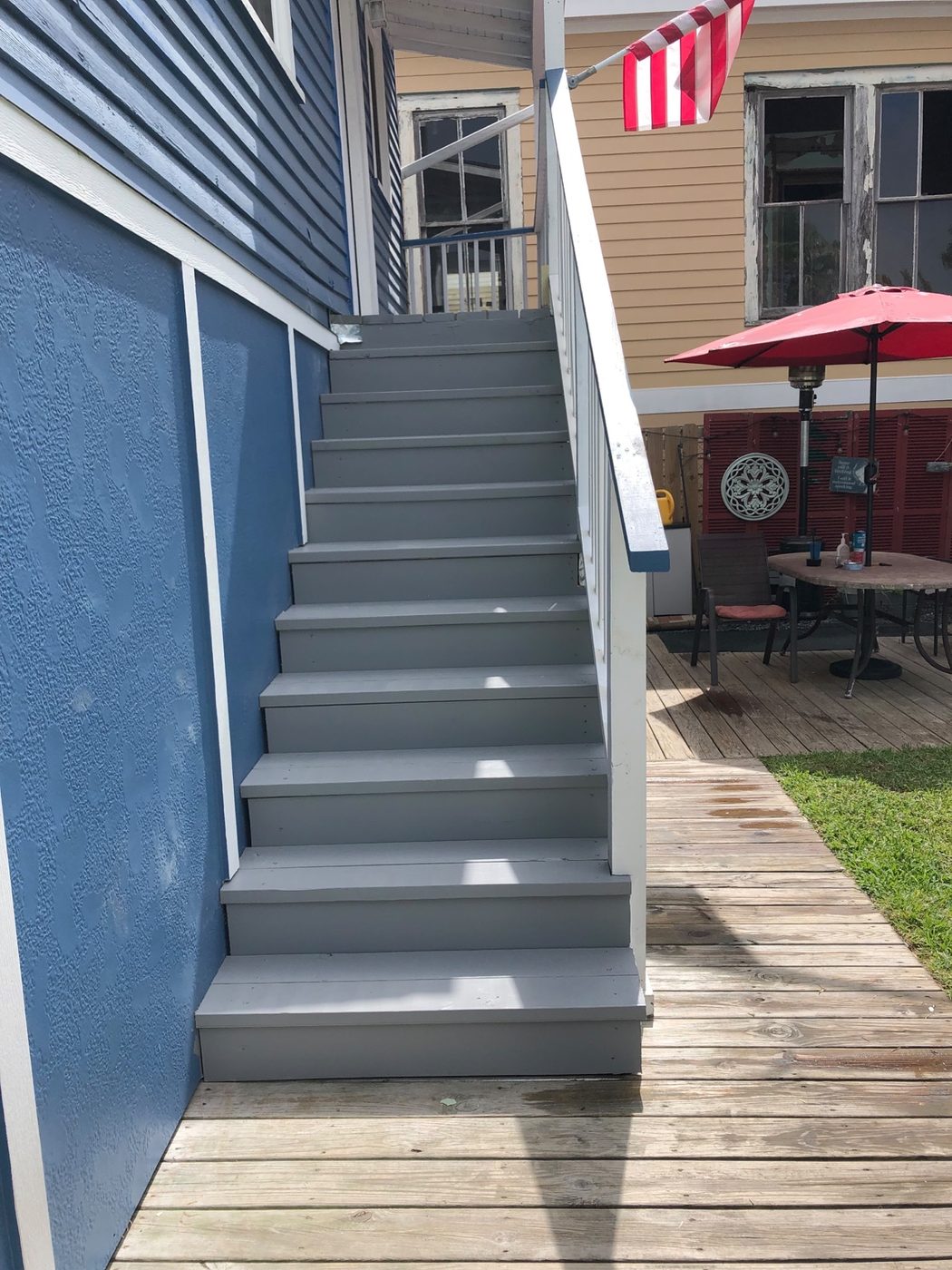 Freshly painted exterior stairs and deck area